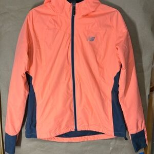 Coral New Balance Women’s size L windbreaker